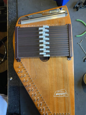 Wooden zither Restrining and Cleaning Service Orange County 